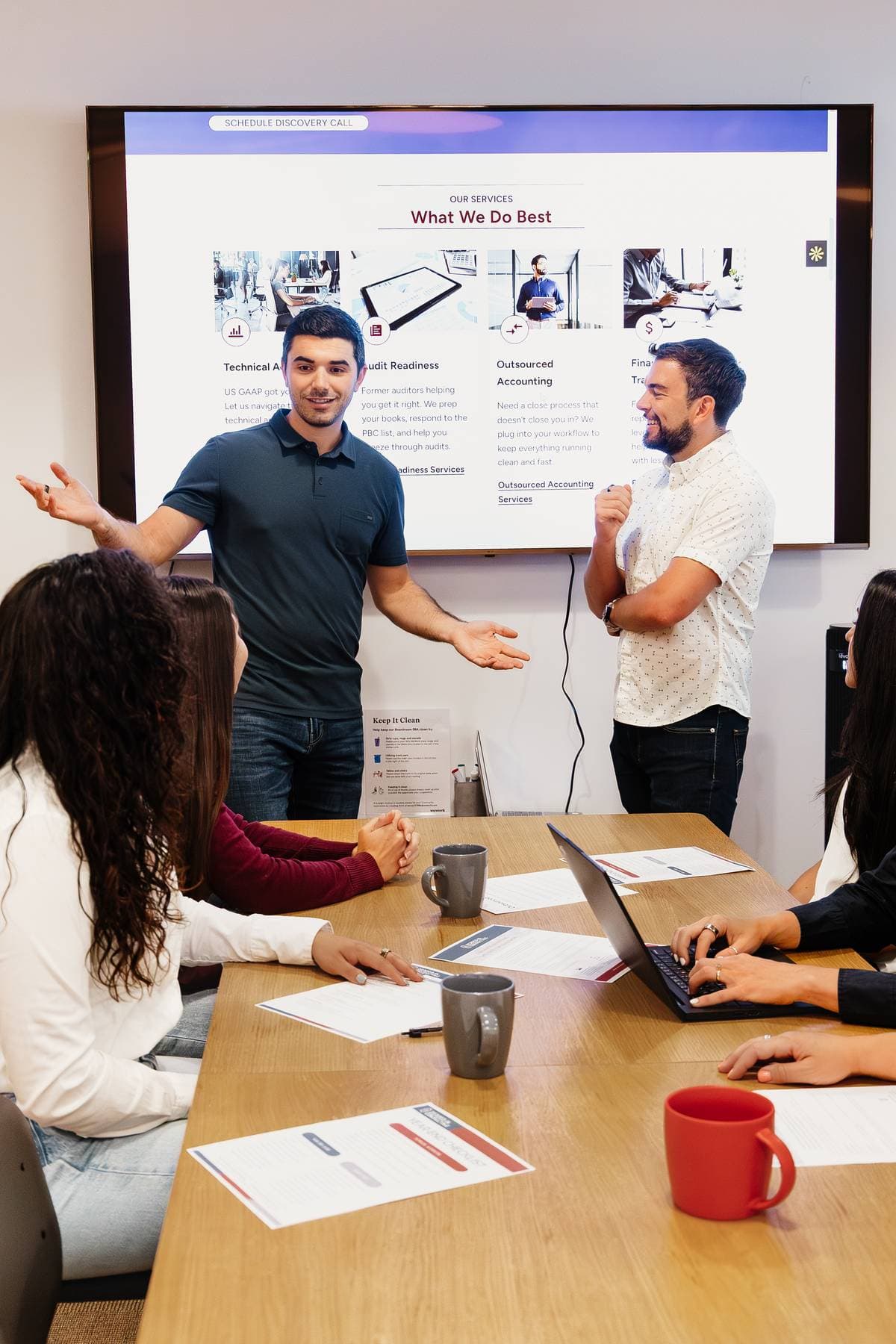 John and Kyle presenting to the Zeroed-In team